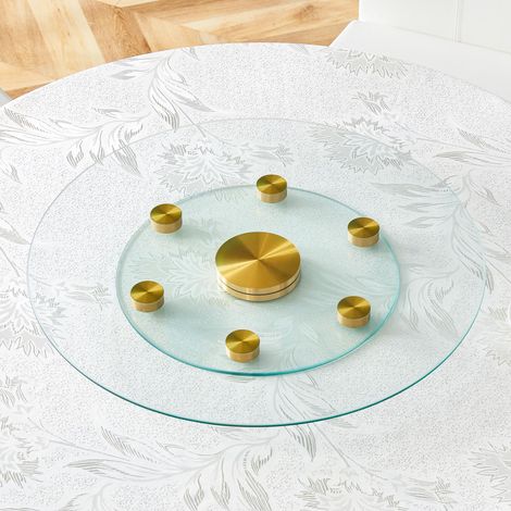 Plateau de table. Plateau rond en verre à deux niveaux, pivotant. Le diamètre du plateau supérieur est de 61 cm, celui du plateau inférieur de 38 cm. Son système pivotant facilite la prise en main et 