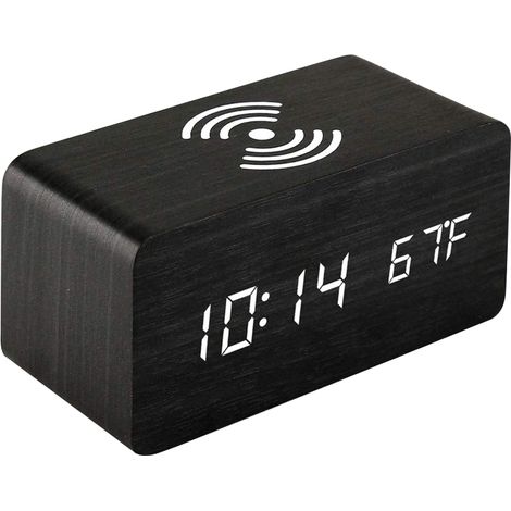 Reloj despertador digital LED con cargador inalámbrico y pantalla de temperatura.