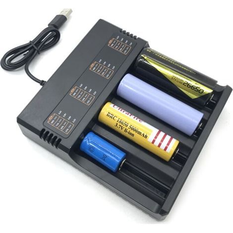 Cargador inteligente para baterías de litio 18650 de 4 ranuras, recargable mediante USB universal. (1/4)