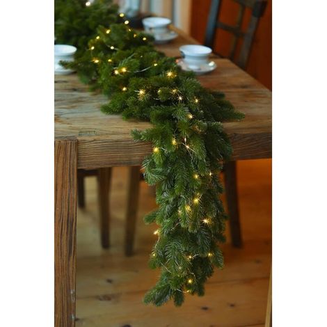 Guirlande de Noël 6FT Guirlande de pin avec guirlande lumineuse LED 9.8FT, plante de verdure pour décorations de Noël Table Manteau Fond Mur Chambre Extérieur Intérieur Décoration d'hiver (1/5)