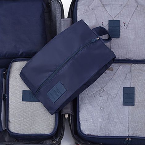 Lot de 7 cubes de rangement imperméables et résistants à la saleté en tissu Oxford, couleur cyan, pour vos bagages et vos voyages. (1/5)
