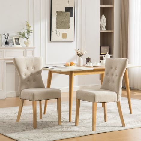 Chaises de salle à manger modernes et haut de gamme, en bois massif avec revêtement en tissu chenille, pieds en bois massif et détails cloutés. 2 pièces par carton. - Beige