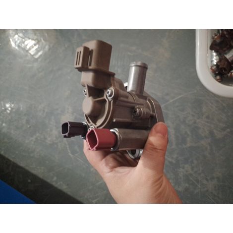 Idle motor E9T16071, compatible with automotive parts E9T16071A, Ford idle motor. (1/2)