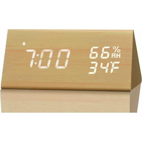 Avec du boisdirigéRéveil numérique avec affichage électronique de l'heure.3Plusieurs réglages d'alarme, détection de l'humidité et de la température, et une horloge numérique en bois jaune sur la tabl (1/5)