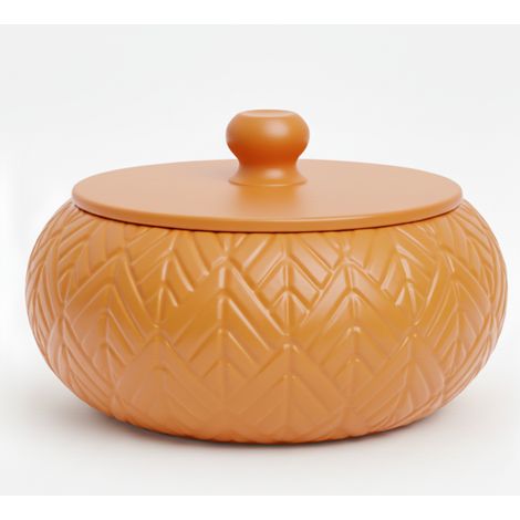 Scatola portagioie arancione con coperchio decorativo per la toeletta.