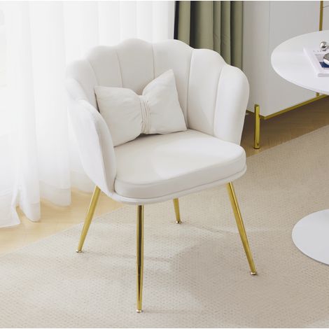 Poltrona da soggiorno beige in velluto con schienale a petalo, gambe in metallo dorato e cuscino farfalla (1/5)