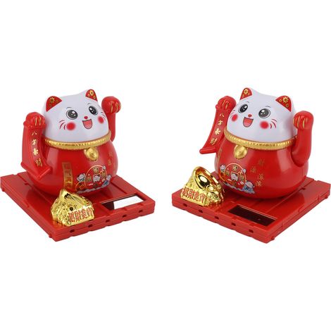 Chat porte-bonheur solaire aux couleurs vives, économe en énergie, agitant la main, symbole de richesse et de bienvenue, décoration de bureau rouge en forme de X. (1/5)