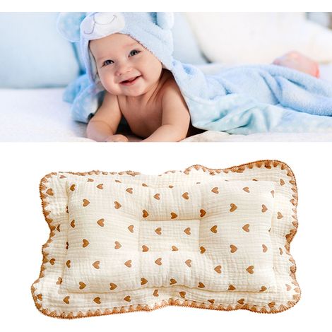 Coussin pour bébé en forme de cœur, orné de dentelle et d'imprimés de dessins animés, respirant et confortable, pour les bébés de 0 à 6 mois. (1/5)