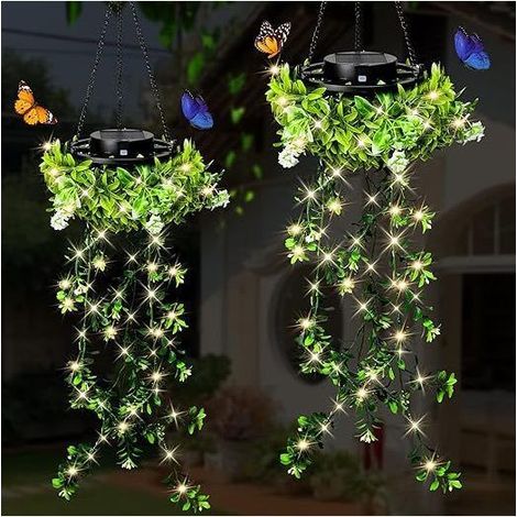 Suspensions solaires Milan Grass : lumière chaude, étanches, idéales pour décorer terrasse et jardin. (1/5)