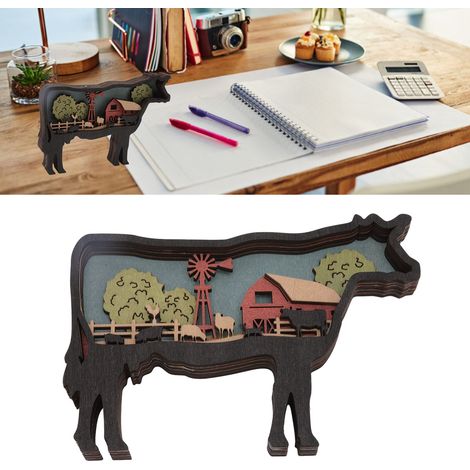 Décoration intérieure créative sur le thème des animaux de la ferme : sculptures en bois de vaches, moutons, cochons, objets de décoration de bureau et vaches. (1/5)