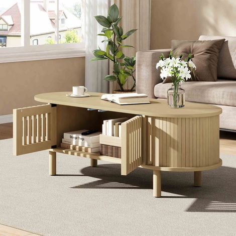 Table basse ovale 100x40x38 cm en MDF avec 2 portes cannage et porte coulissante, table de salon avec rangement, pieds en bois - Bois naturel (1/5)