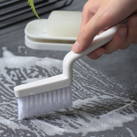 Brosse à récurer ergonomique à poils rigides et flexibles pour le nettoyage des recoins et des sols de salle de bain et de cuisine (blanche). (1/5)