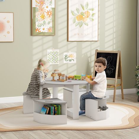 Table enfant gain de place et 4 tabourets avec rangement en bois. Gris.