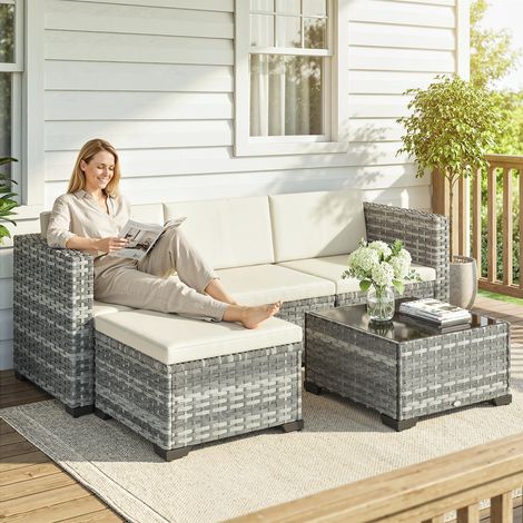 Conjunto de muebles de jardín de poliratán, 5 piezas, conjunto de salón con sofá esquinero, taburete, mesa, cojines de asiento y respaldo, gris y blanco crema.