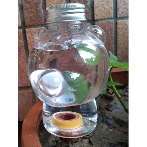Arroseur automatique pour pots de fleurs, goutteur paresseux - Motif ours. Matériaux : tête en terre cuite et plastique. (1/5)