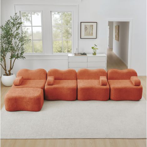Canapé d’angle modulaire 4 places en velours orange avec ottoman, sans cadre, forme ondulée (1/5)