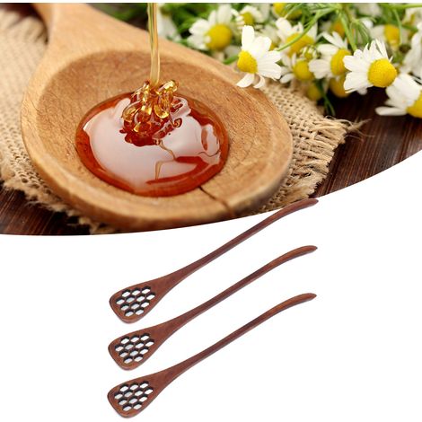 Cuillère à miel en bois sculpté en forme de nid d'abeille, laquée. (1/5)