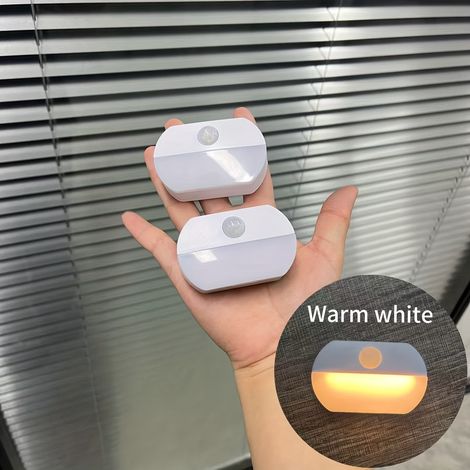 Lot de 2 veilleuses LED intelligentes à piles avec détection de présence, à activation par mouvement, pour couloirs, escaliers et salles de bains, lumière blanche chaude (1/5)