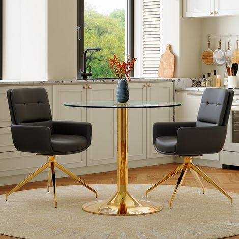 Ensemble table et chaises design : table ronde en verre céramisé 85 cm, style chic, piètement en acier, avec 2 fauteuils pivotants 360° en simili cuir noir et doré. (1/5)