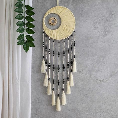 Attrape-rêves mural en macramé avec longs pompons et perles (1/4)