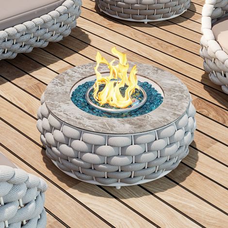 Brasero rond au gaz propane Tatta avec design tressé, idéal pour le barbecue