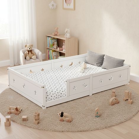 Lit simple 120x190 cm en bois pour enfant, 1 place, avec barrières décorées de motifs étoiles et lune, sommier à lattes - Blanc