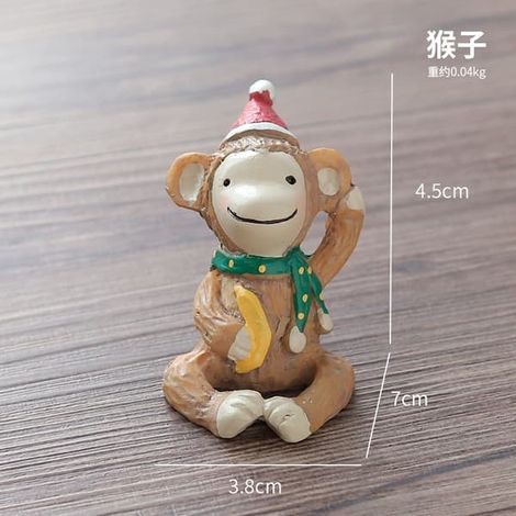 Cinq figurines miniatures en résine représentant une famille d'animaux de Noël (1/5)