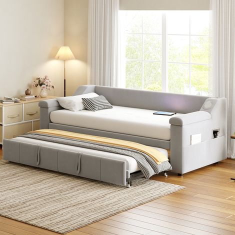 Cama sofá moderna 90/180x190 cm tapizada en terciopelo gris claro con Bluetooth, USB, compartimentos y somier de láminas