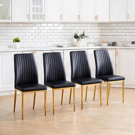 Chaises de salle à manger noires dorées avec piètement en métal (1/5)