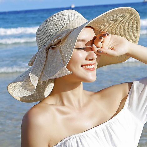 Chapeau de soleil en paille à larges bords avec grand nœud et protection UV pour femmes et filles (1/5)