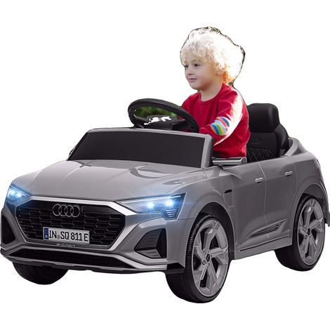 Coche eléctrico, control remoto, faros y sonido, color gris. (1/2)
