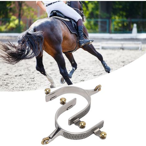 Une paire d'éperons de cowboy western vintage en acier inoxydable et laiton, d'une qualité exceptionnelle, pour les jardins extérieurs et les accessoires d'équipement équestre. (1/5)