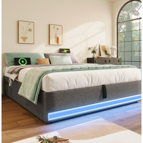 Letto imbottito moderno 140x200 cm in lino grigio, con LED, USB e Type-C, vano contenitore idraulico e tasche laterali