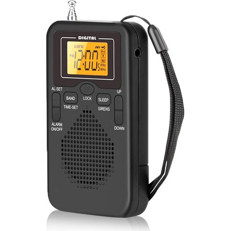 Radio FM/AM portable, équipée de 2 piles, d'un haut-parleur stéréo, d'un casque et d'un réveil numérique LCD. (1/5)