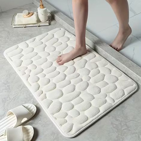 Tappetino da bagno rettangolare in morbidissimo pile di corallo antiscivolo, con retro in PVC ad asciugatura rapida. (1/3)
