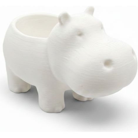 Una maceta blanca con forma de hipopótamo para suculentas y flores. (1/3)