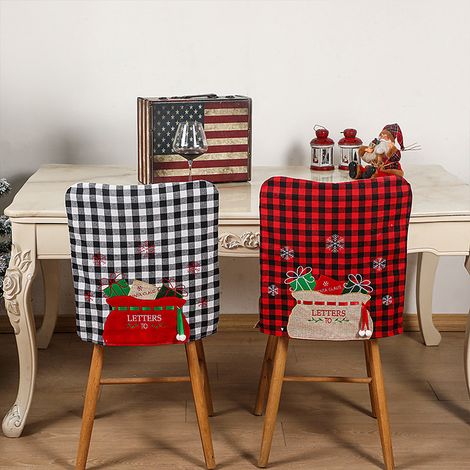 4er-Set Weihnachtsstuhlrückenbezüge, schwarz-weiß kariert, weich, aus Vliesstoff, dekorativ, für Esszimmer und Küche (1/5)