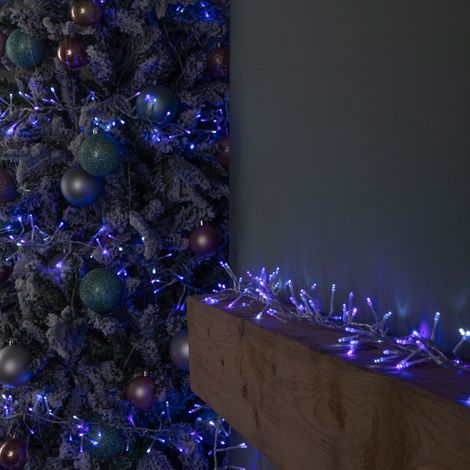 12.4m 960 LED Christmas Cluster Multi-Action String Lights with Timer in Blue, Purple & White on Clear Cable (1/5)