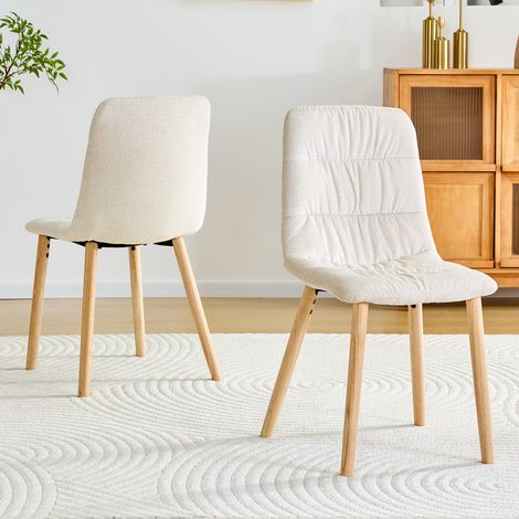 Lot de 2 chaises à manger nordiques tissu blanc pieds bois massif 88cm. Style minimaliste élégant pour aménager cuisine et salle à manger.