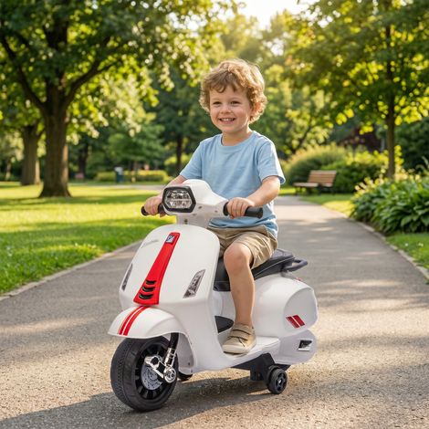 Moto électrique blanches pour enfants de 2 à 6 ans avec batterie 6V, phare et roues auxiliaires (1/4)