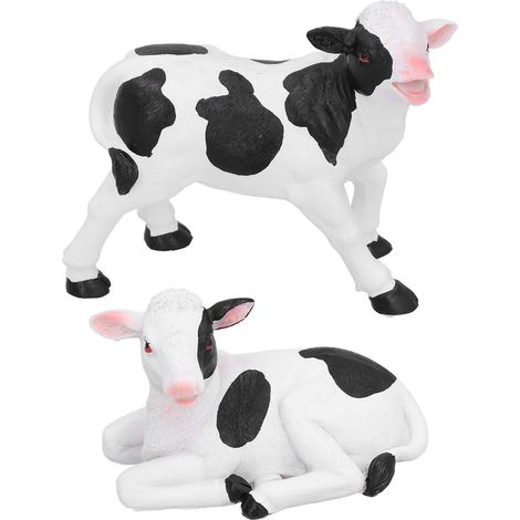 2 Kuhfiguren aus Kunstharz, Tierskulpturen