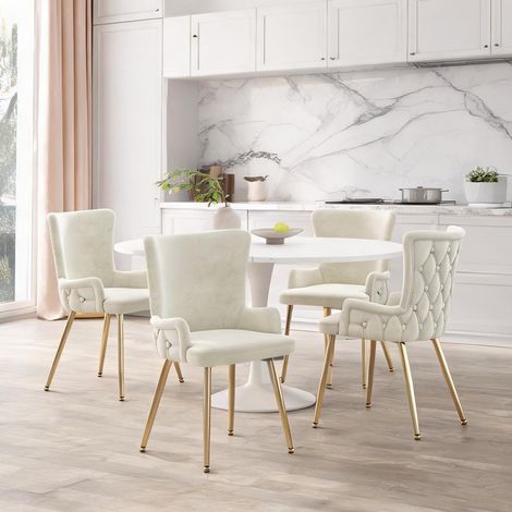 Lot de 4 chaises en velours beige avec piètement métal doré (1/5)