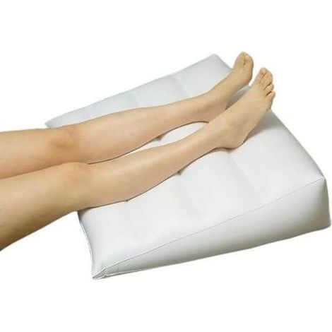 Coussin orthopédique gonflable pour jambes et dos (1/2)