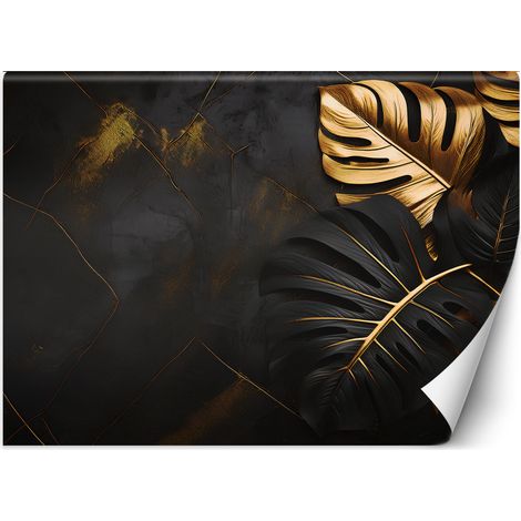 Fototapete goldene und schwarze Monstera-Blätter auf einem abstrakten Hintergrund 100x70 cm