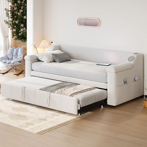 Canapé-lit capitonné 90/180x190 cm en velours beige, accoudoirs avec Bluetooth, USB et rangements (1/5)