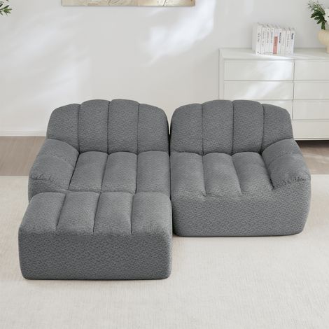Canapé d'angle 2 places sans armature, forme coquille, assises profondes avec repose-pieds, gris