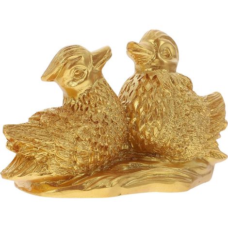 de canard mandarin en résine dorée idéale comme décoration