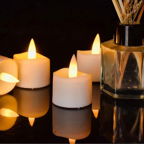 Another Christmas decoration: 12 flickering LED tealight candles with timer, mini flameless battery-operated tealight candles, warm white flickering (1/5)