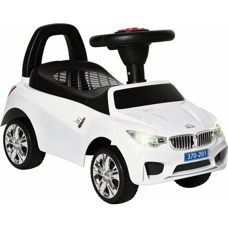 Elektrisches Kinderauto mit Lenkrad, Scheinwerfern und Musik, 18–36 Monate, weiß (1/5)