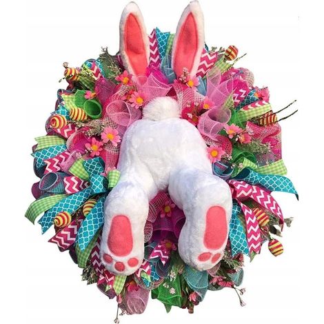 Decorazione pasquale per la porta con ghirlanda e zampette di coniglio in peluche. (1/5)